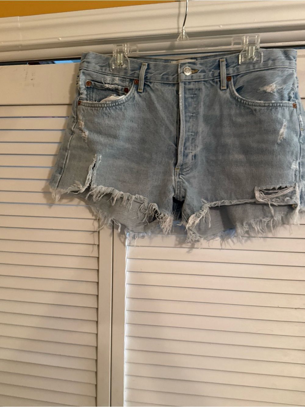 Agolde Light Wash Distressed Denim Cutoff Shorts